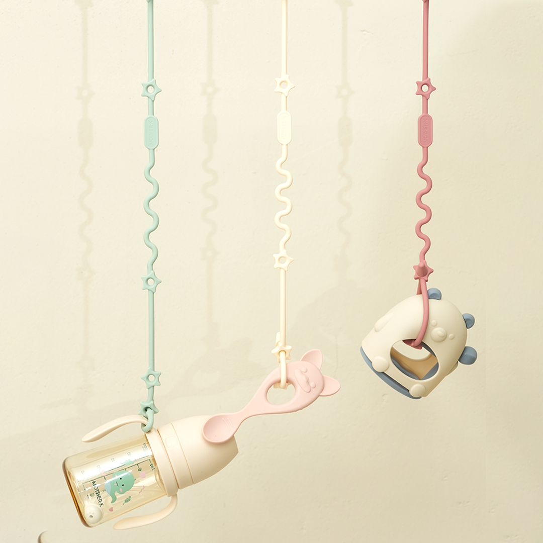 Mother-K Multifunkcinis silikoninis laikiklis, kreminis